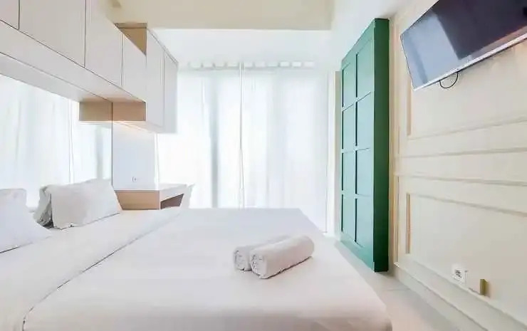 Cozy Stay Studio Apartment at Tree Park City BSD By Travelio