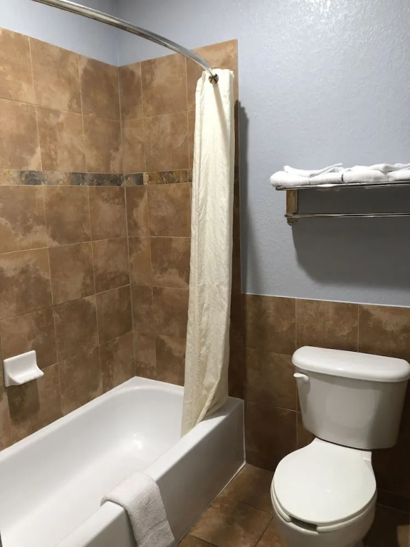 The Symphony Inn & Suites