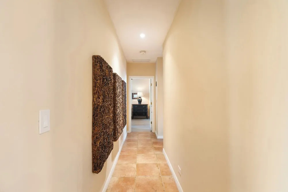 Luxe! Impressively designed 2nd-floor unit in Coco done in red and orange hues