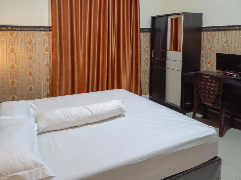 Homestay Singgasana Mitra RedDoorz