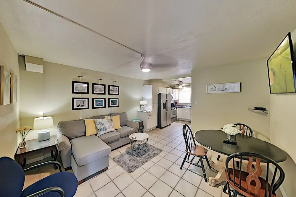 Lovely Canal-front W/ Pools & Boat Slip 2 Bedroom Condo