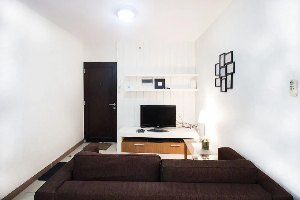 2BR Cozy at Empyreal Epicentrum Apartment By Travelio