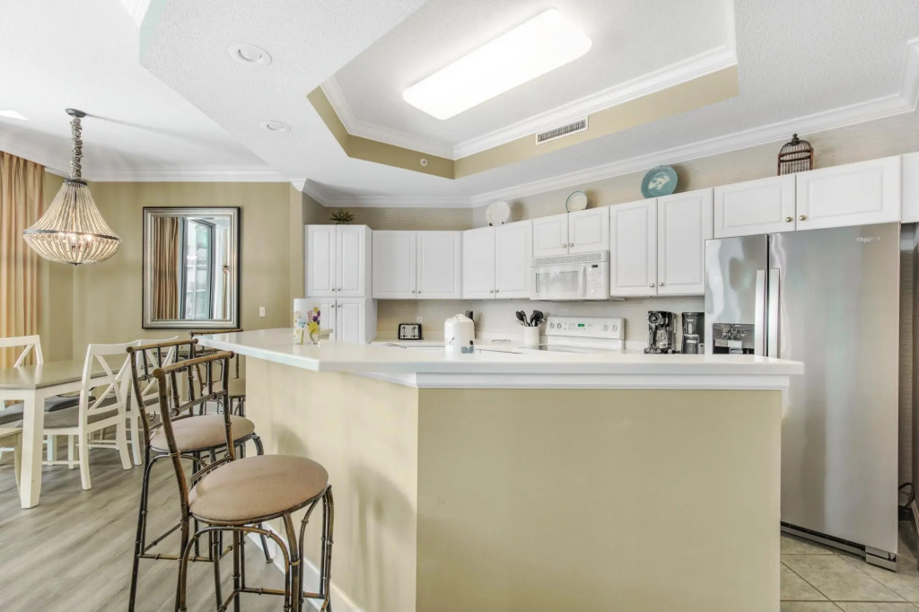Condo on bay with boat launch and multiple pools