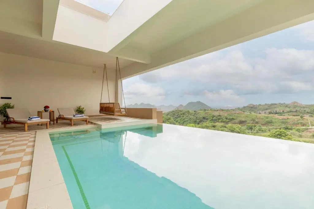 SaffronStays Aurum Villa, Moringa Valley - 3BR hilltop villa with Aravalli views, bonfire & trails near Lake Pichola