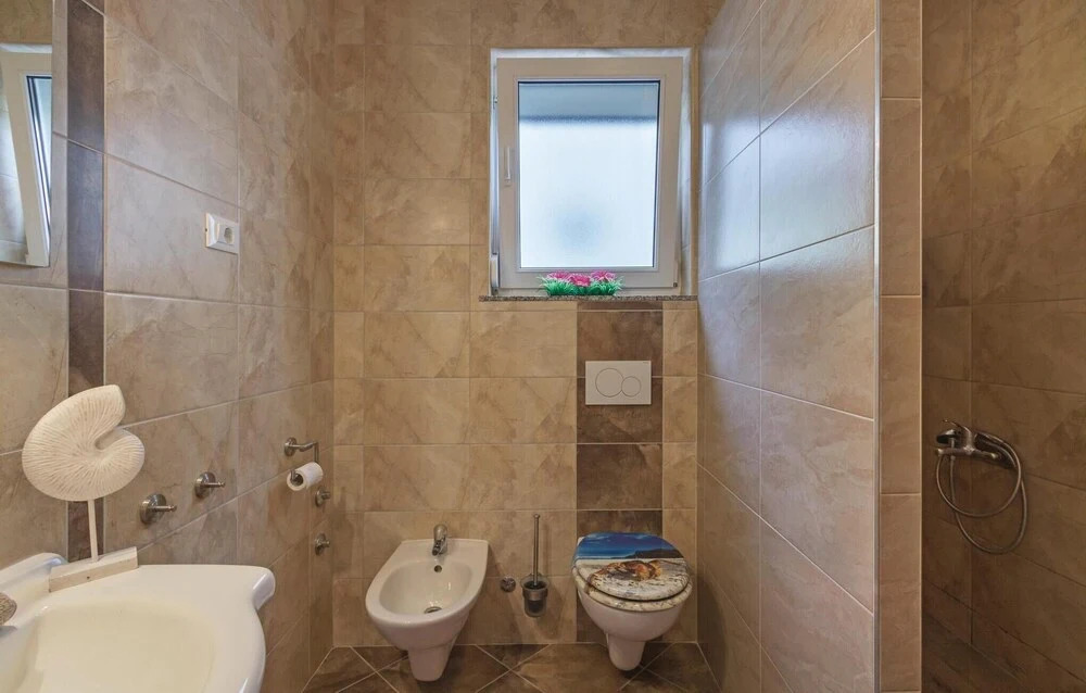 Beautiful Home in Peroj With 6 Bedrooms, Outdoor Swimming Pool and Wifi