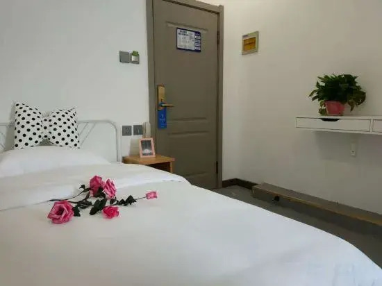 Daqing Boger Hotel (Xinmate Store)