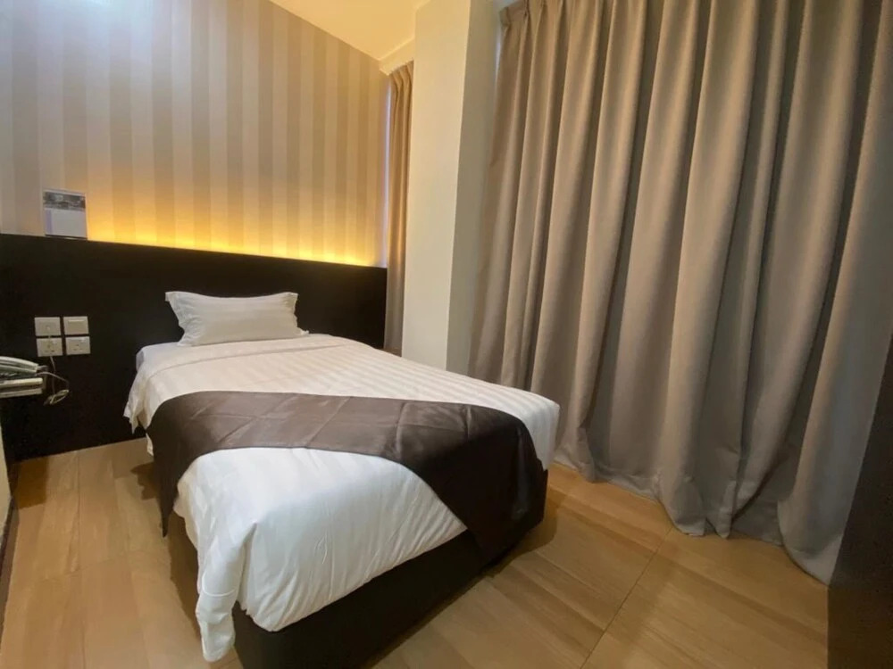 Capital O 90447 Hotel Ezzyhome Kebun Teh