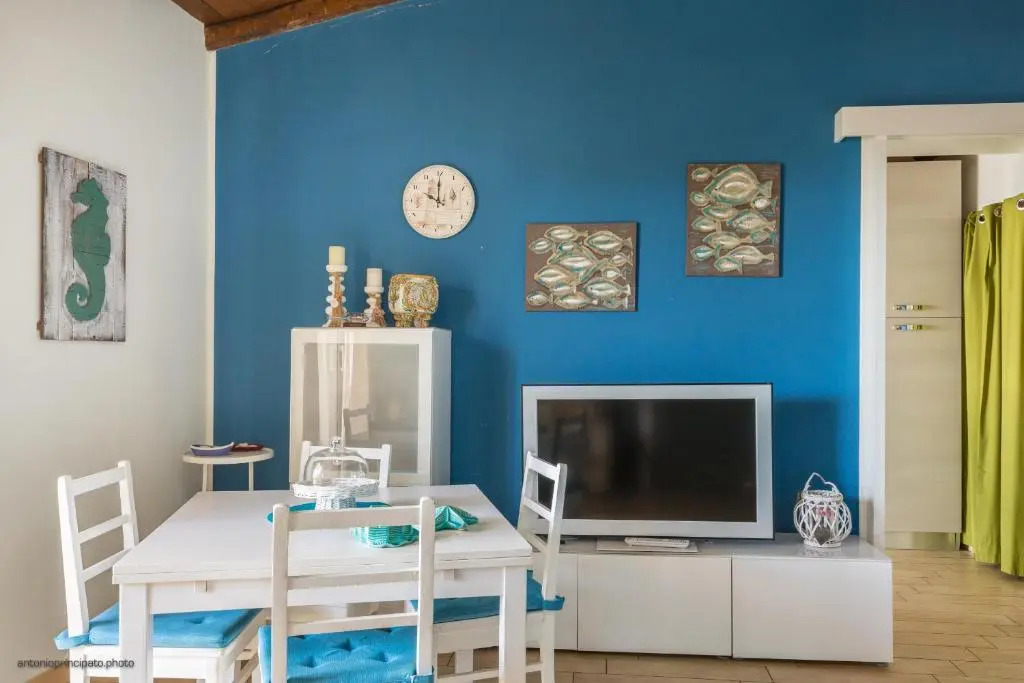Blue house on the sea