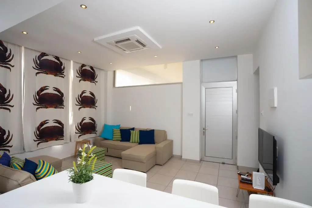 Athenaeum Beachside Apt by TrulyCyprus