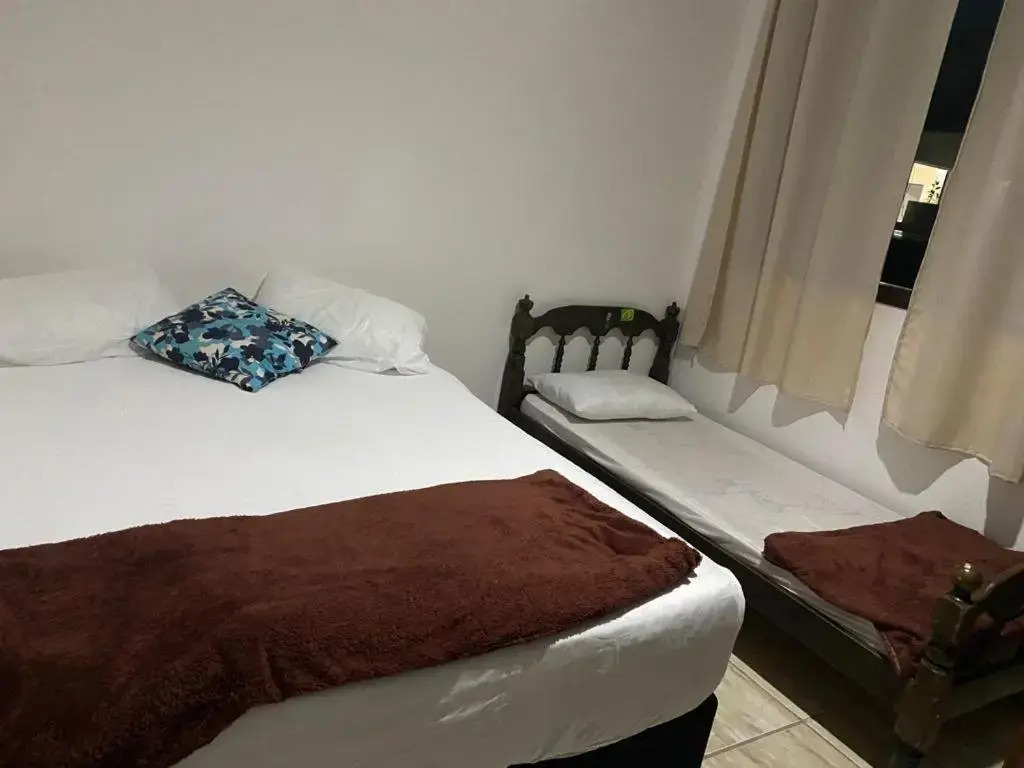 Pousada Casa de mãe aconchegante com piscina próximo à praia