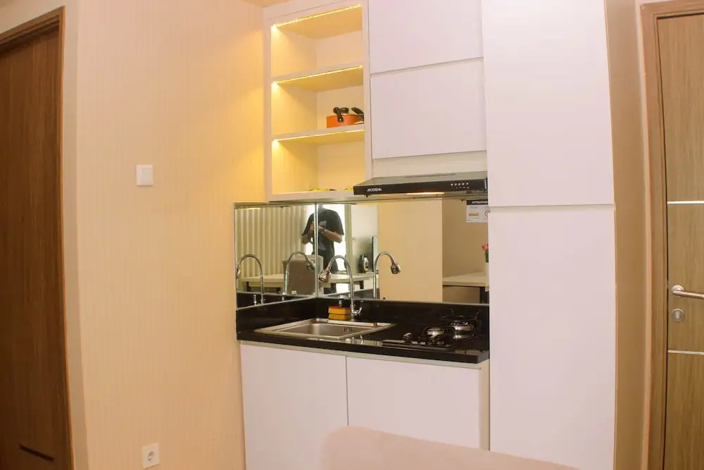 Cozy and Comfort Living 1BR at Oasis Cikarang Apartment By Travelio