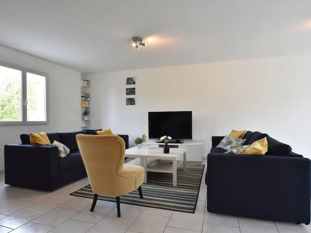 Sleek, Modern and Spacious Villa With the Invasion Beaches in the Back Garden