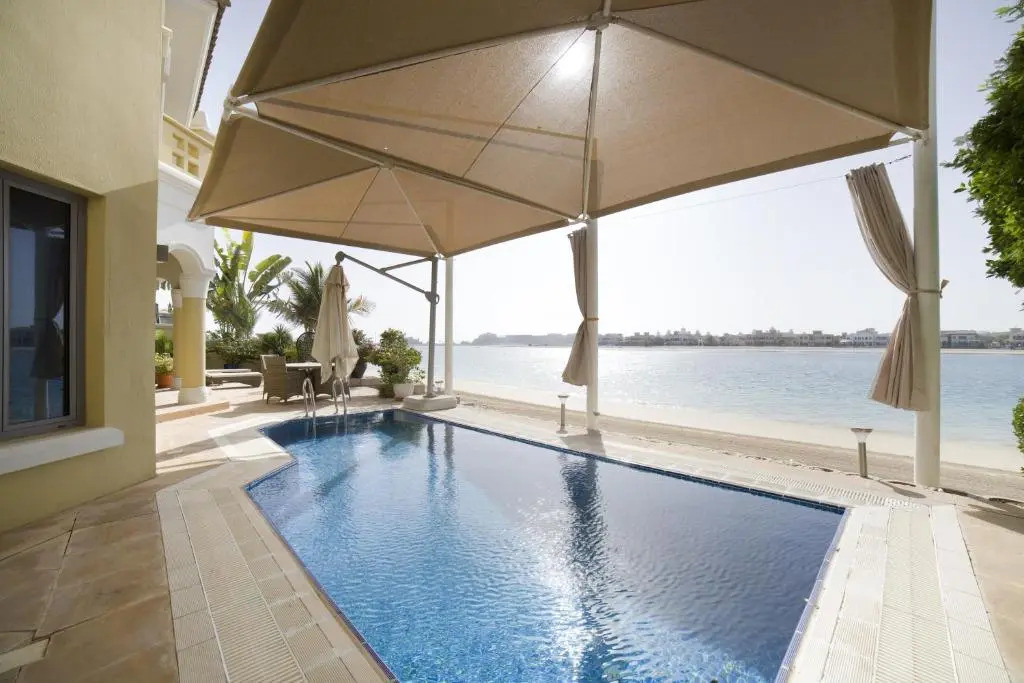 Deluxe 4BR Palm Villa With Private Beach and Pool with Complimentary Golf