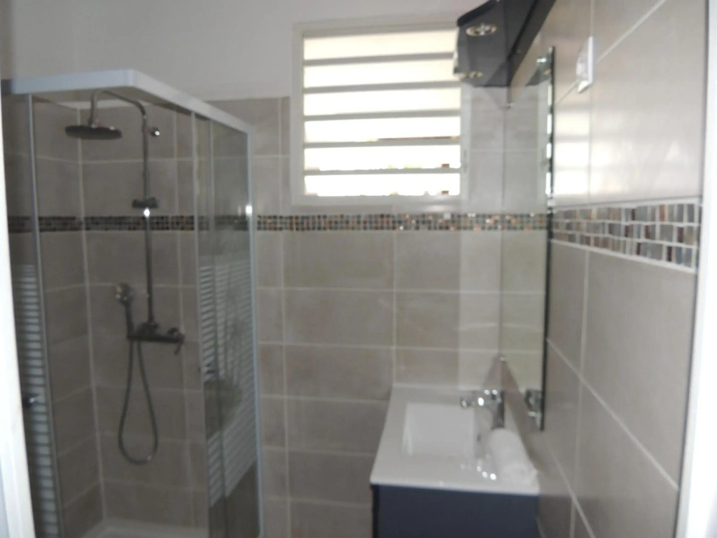 Appartement de 3 chambres avec piscine partagee jardin clos et wifi a Bouillante a 1 km de la plage