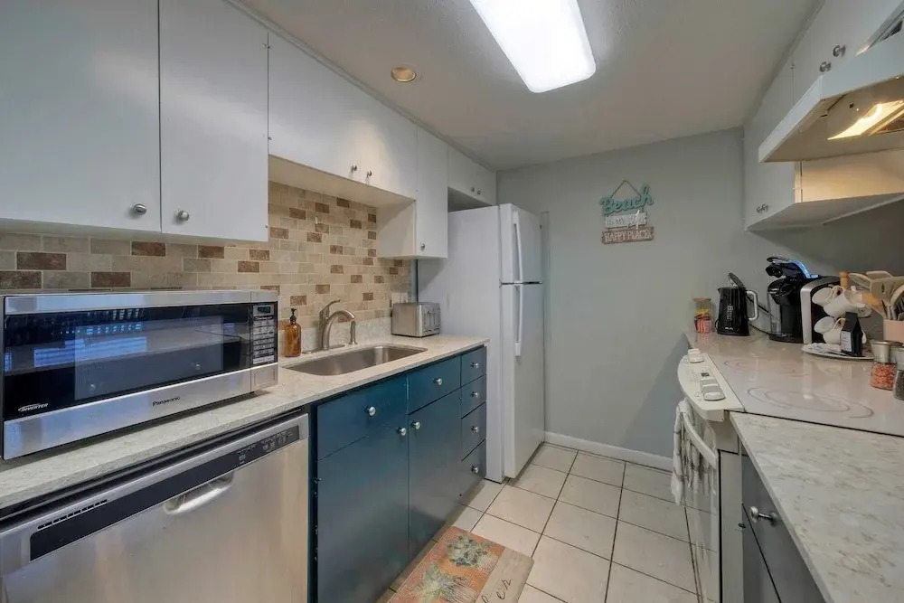 Minutes to the Beach, Pool, Balcony w/ Nature Views Compass 17 by Avantstay