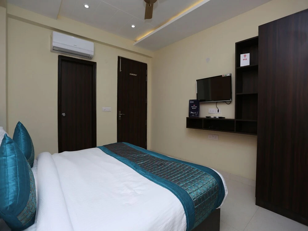 OYO Flagship 12081 Palm Garden Suites