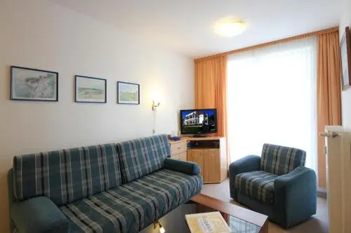 Haus Strandburg - hinter Düne und Meer