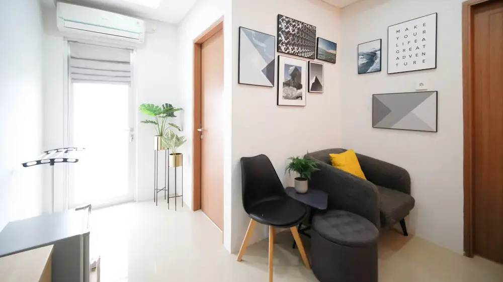 Minimalist and Beautiful 1BR with Extra Room at Pavilion Permata Apartment By Travelio