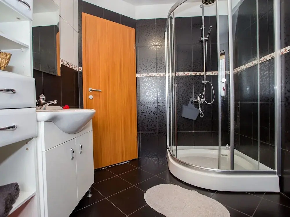 Nicely decorated semi-detached house with pool and  fenced yard