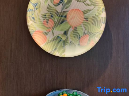 Orange Hotel (Yibin West Railway Station WanXiang World)