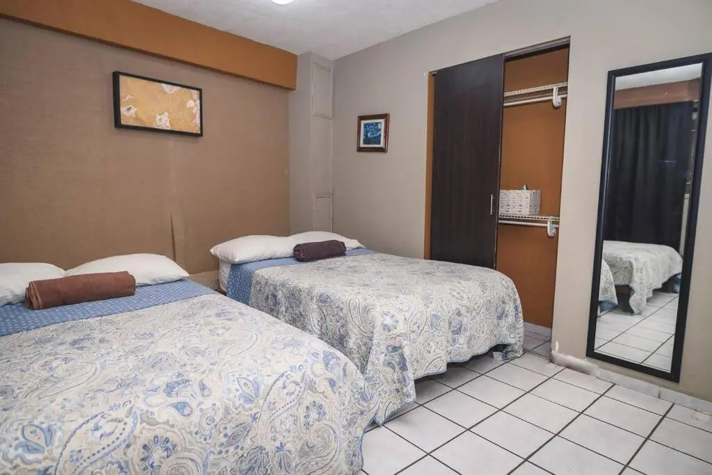 Departamento D centrico 2 camas Tv Ac wifi cocina parking