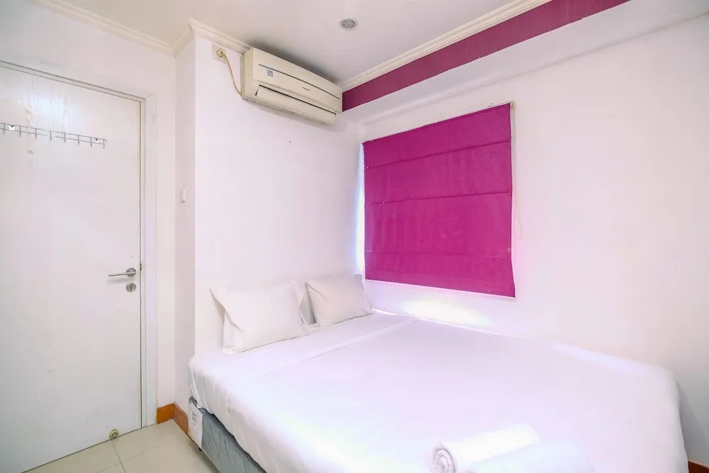 Comfy and Great Choice 2BR Green Pramuka City Apartment By Travelio