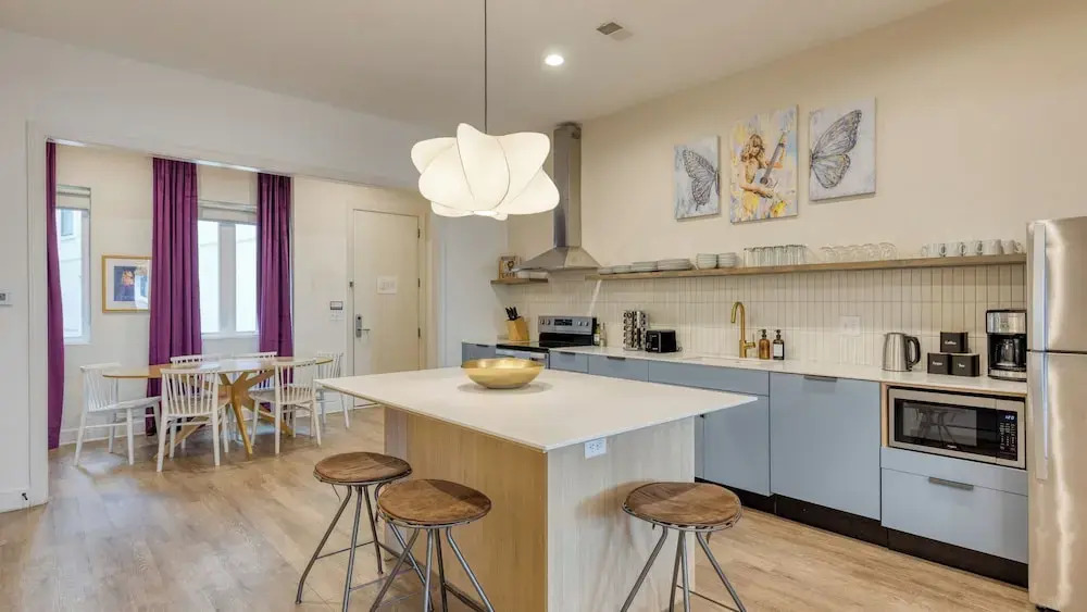 Sleeps 44 4 Themed Lofts w/ Skyline Balconies, Neon Backdrops & Glam Kitchensperfect for Nashville Group Stays The Swift Retreat by Avantstay