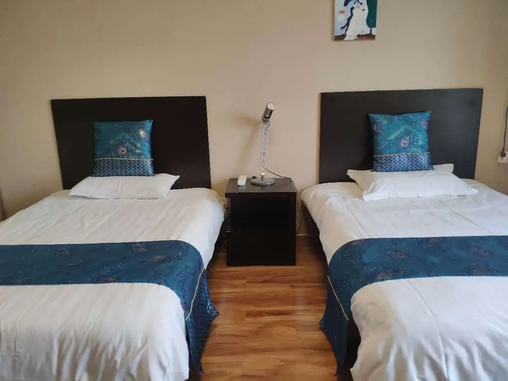 Tiandi Huadian Apartment Boya