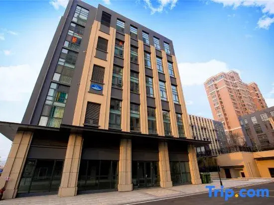 Mu'en Loft Light Luxury Apartment (Qingdao North Railway Station)