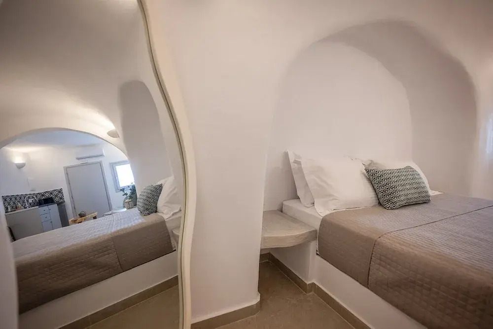 Three Domes Oia - an Iconic Collection