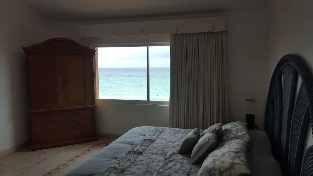 Luxury Beachfront Condo in Royal Sunset Fishermens Resort spa