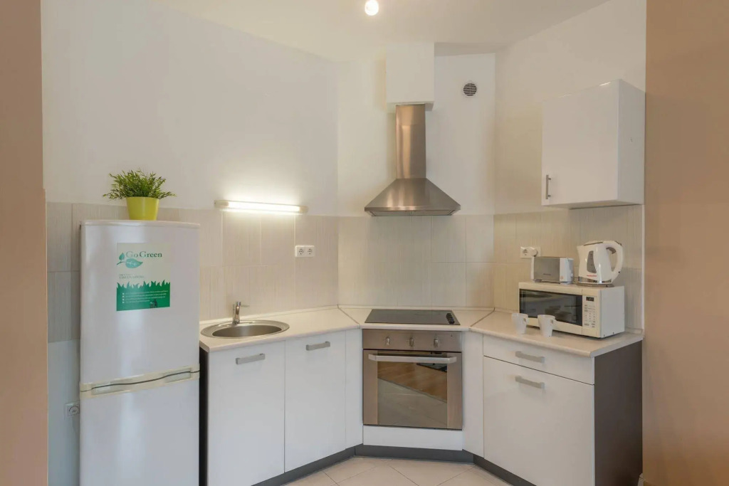 Corvin Plaza Apartments & Suites