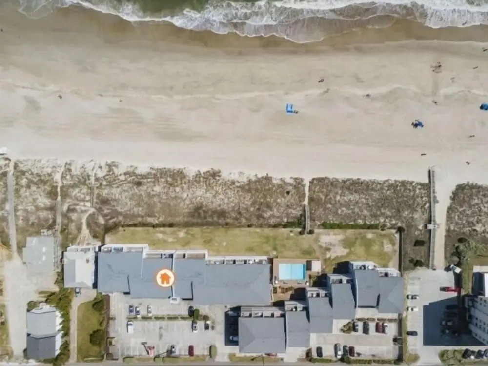 Conched Out - Feel The Ocean Breezes As You Relax On The Deck Overlooking The Lovely Carolina Beach Coastline 2 Bedroom Condo by RedAwning