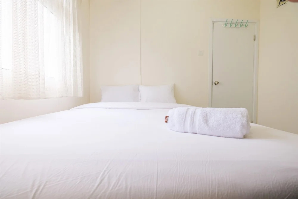 2BR Yotayori Home at Green Pramuka City Apartment By Travelio