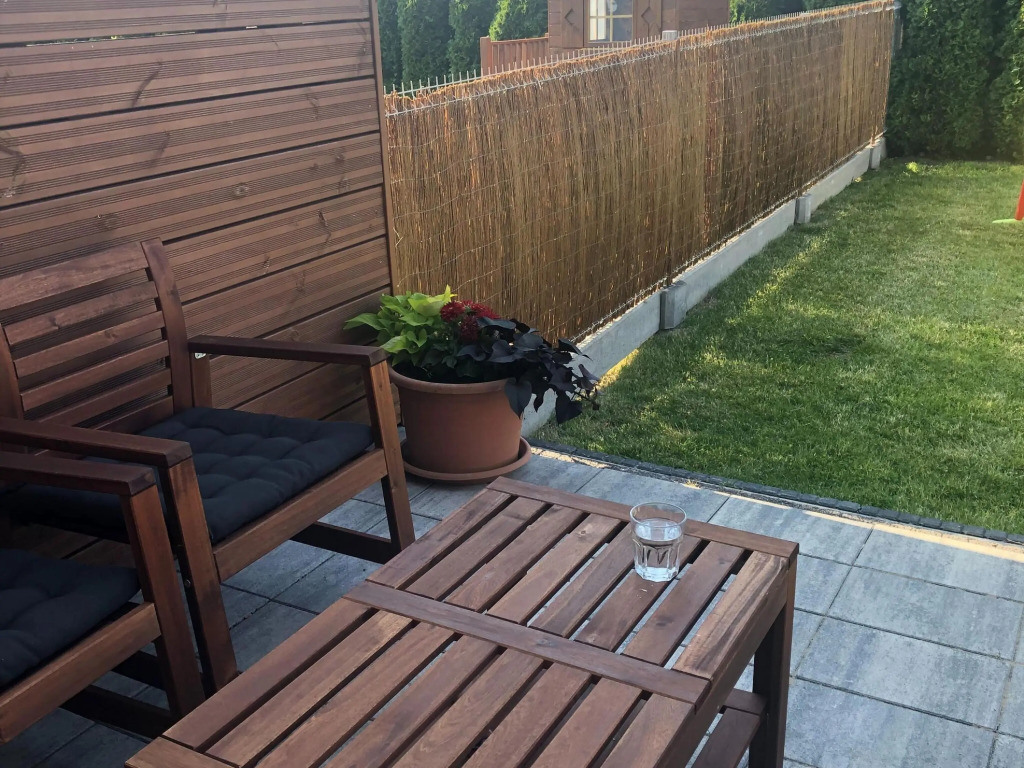 Half of holiday home, terrace, playground