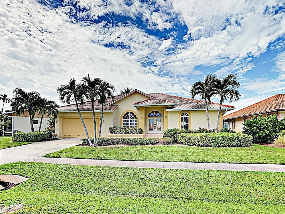 New Listing! Canal-side W/ Pool & Boat Dock 3 Bedroom Home