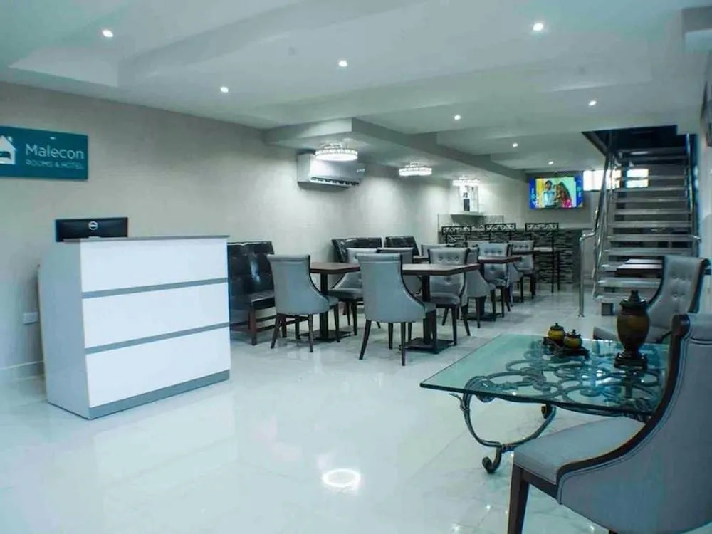 Malecon Rooms y Hotel