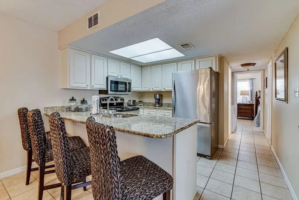 Sandy Shores West Unit 202 by RedAwning