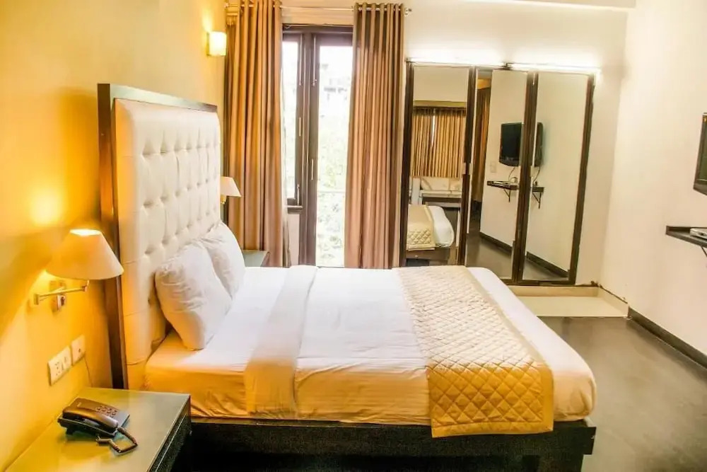 Hotel IP Swarn By Qotel Near Anand Vihar Vaishali Ghaziabad