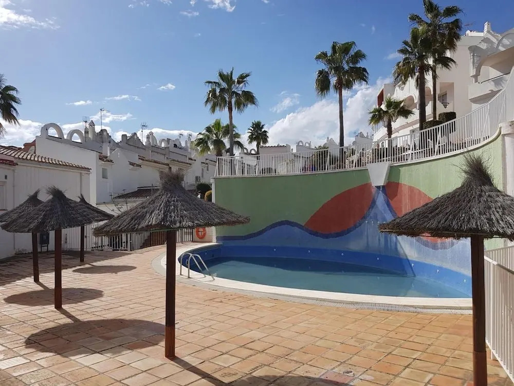 Sunny and spacious apartment with own entrance to pool