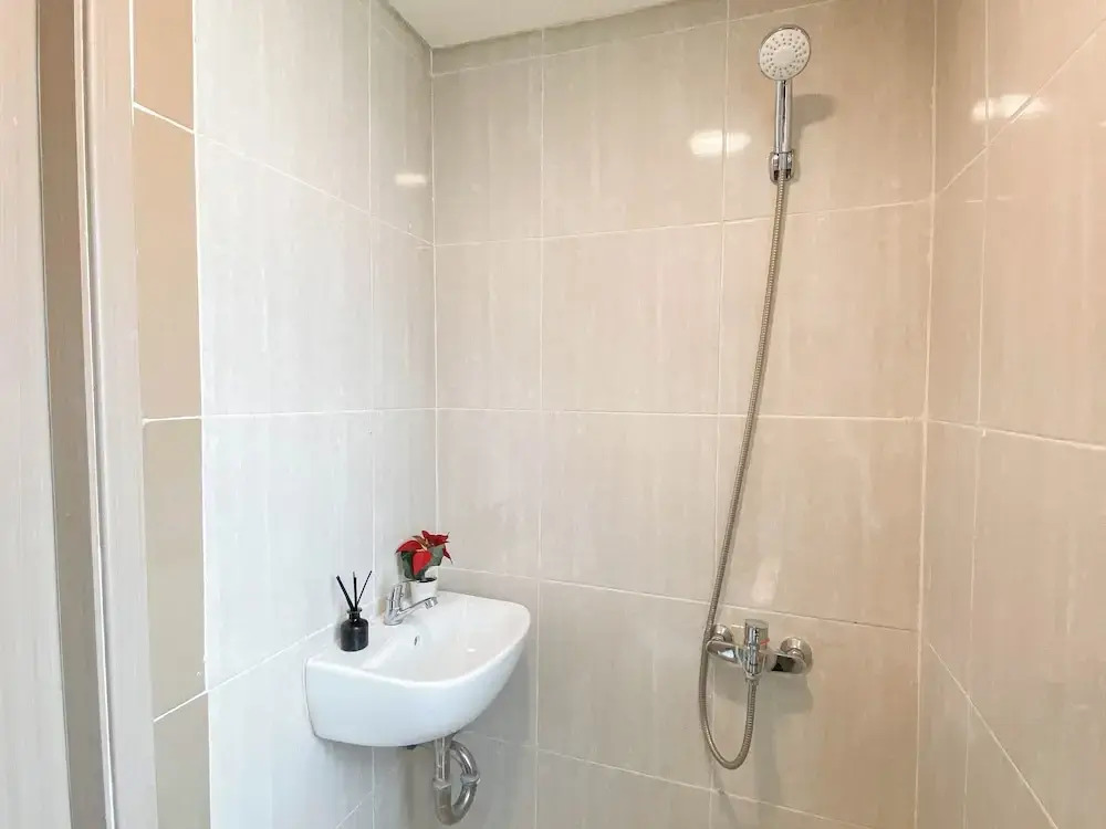 Warm Minimalist Studio Apartment Near Paramadina University At Meikarta