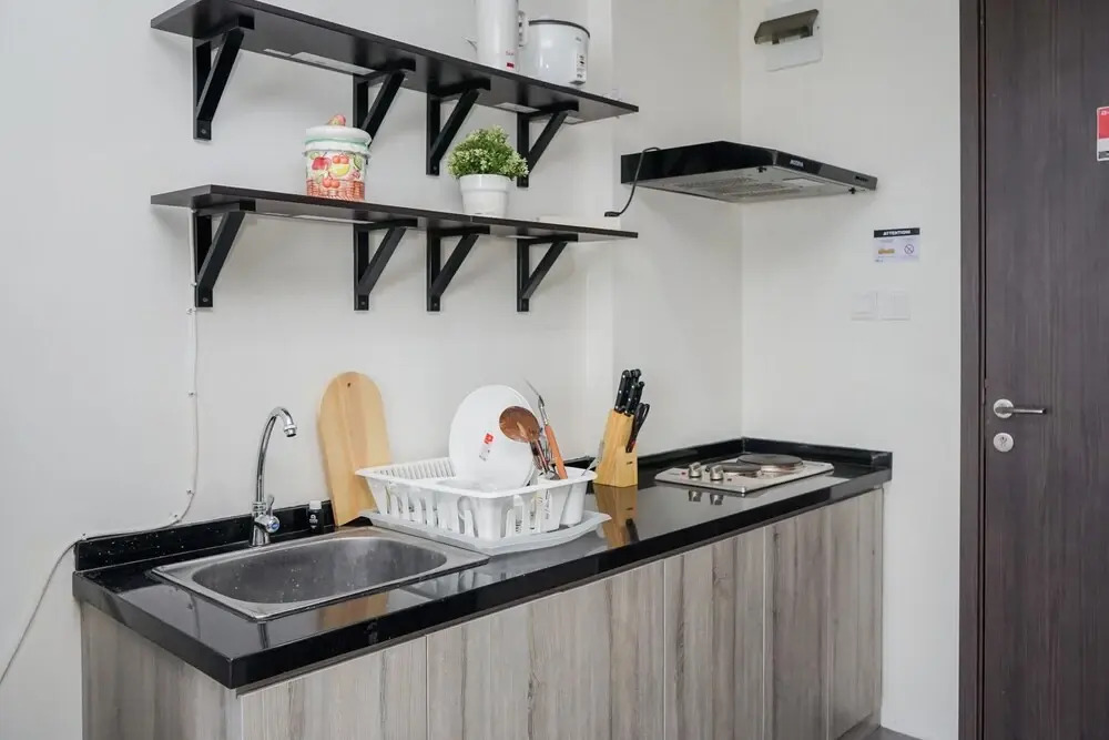 Compact and Monochrome Studio Room Bintaro Icon Apartment