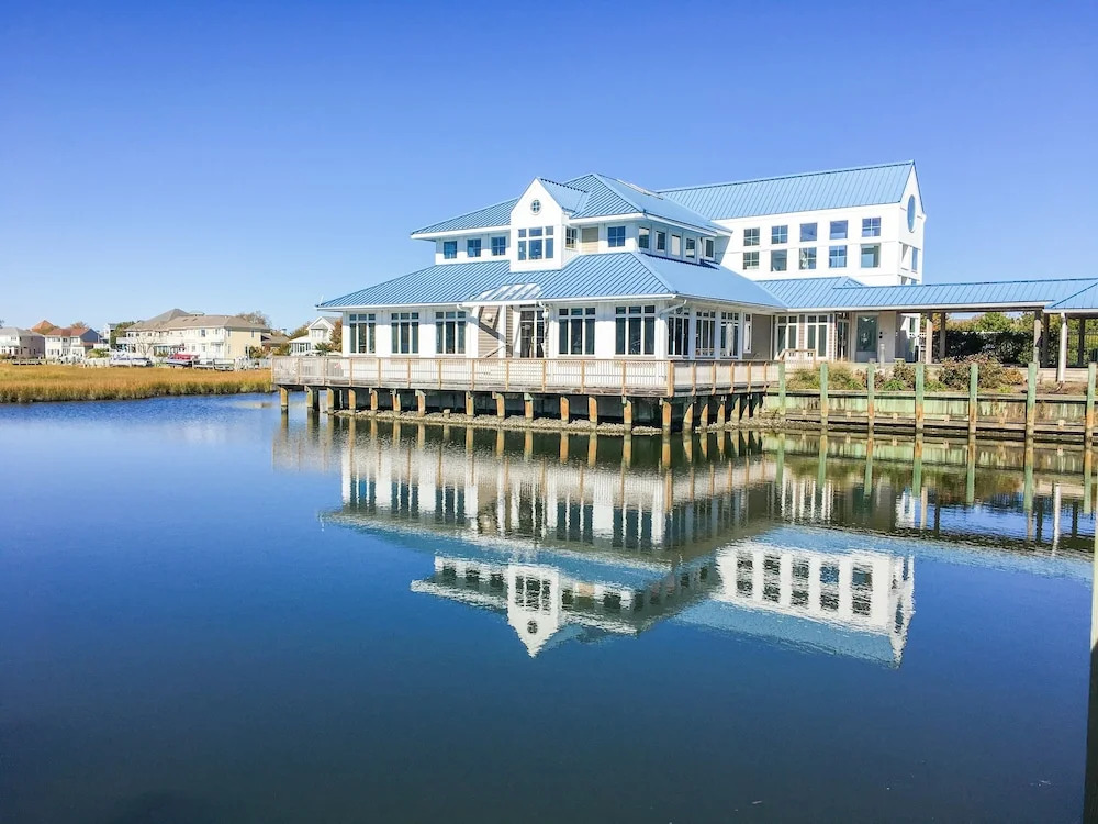 Oceanside Gem W/ Private Deck, Canal Views & Pools 2 Bedroom Condo