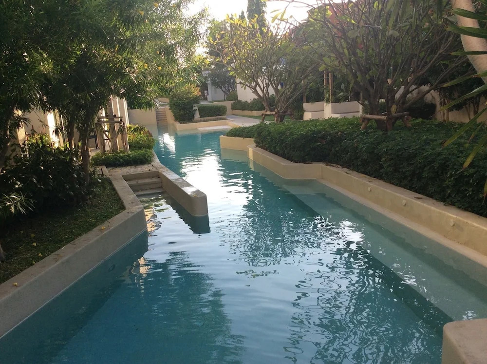 The Che Pool Access Beachfront Condo by Away
