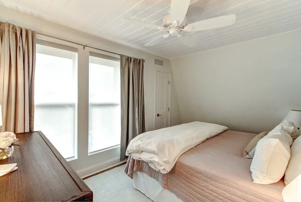 Roomy Chalet-Style Beachfront Condo with Private Beach Access by RedAwning