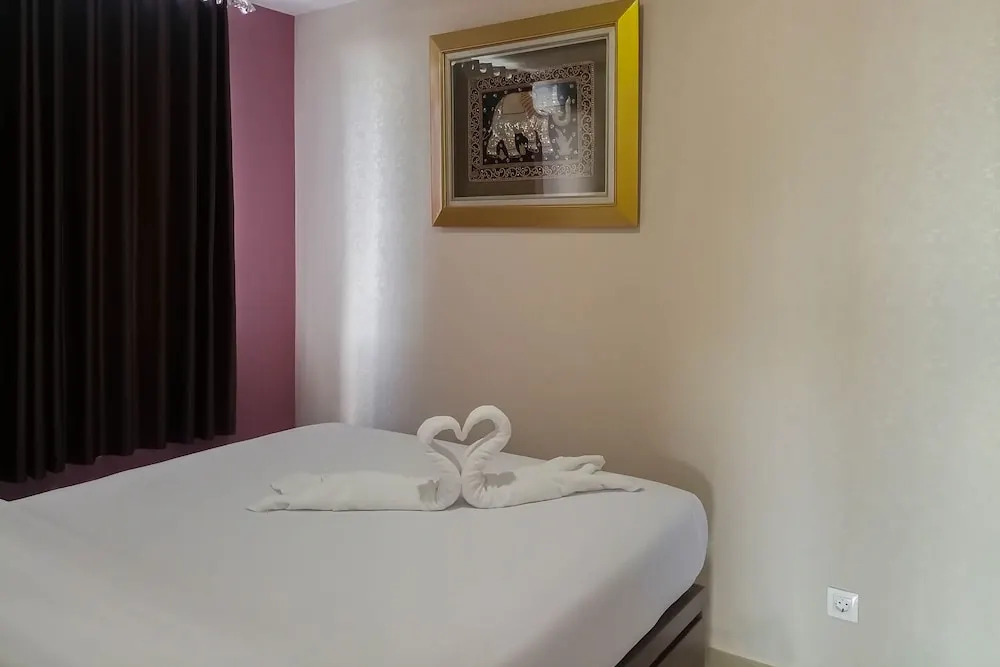Full Furnished with Comfort Design 2BR at Vivo Apartment By Travelio