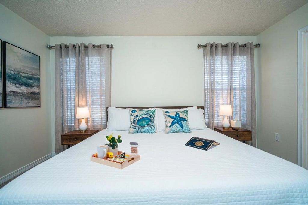 Pet friendly! Modern beach house with private heated pool-7 min walk to private beach access