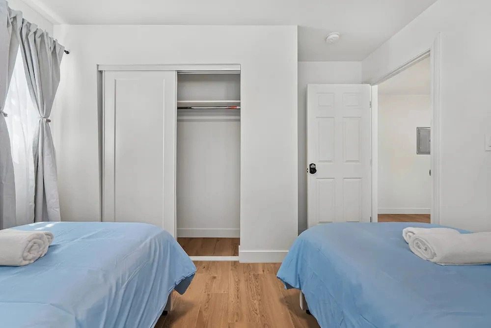 Spacious 8BR Home with AC & Parking