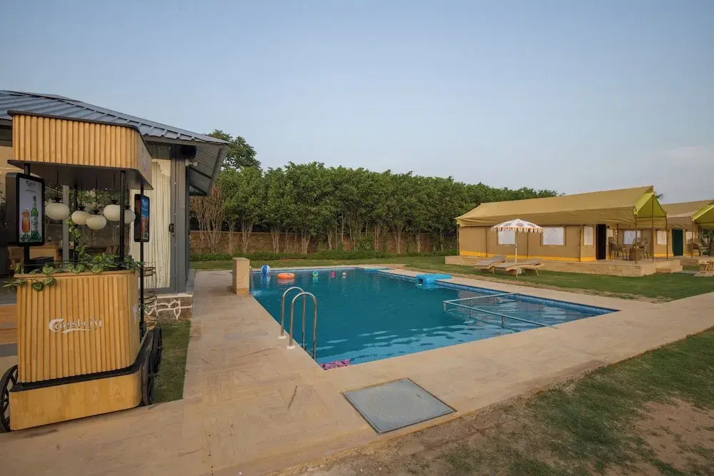 ELIVAAS 5-BHK with Luxe Mudhouses, Tents, Pond & Pvt Pool | Kaimalgarh Farmstay