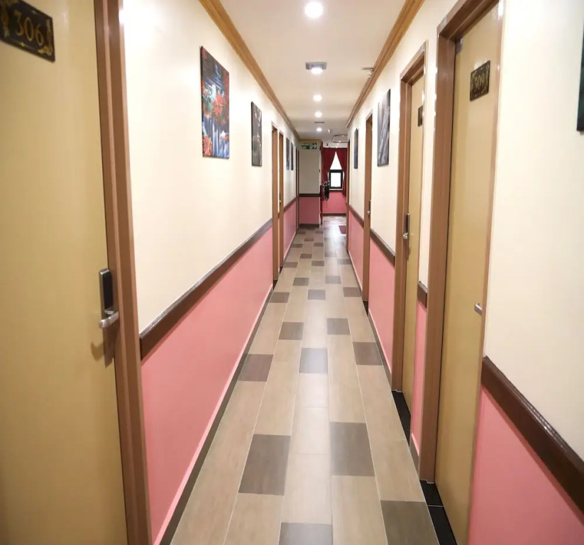 Capital O 90897 Island City Hotel